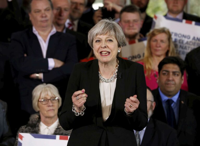 Andrew Yates / PA via AP