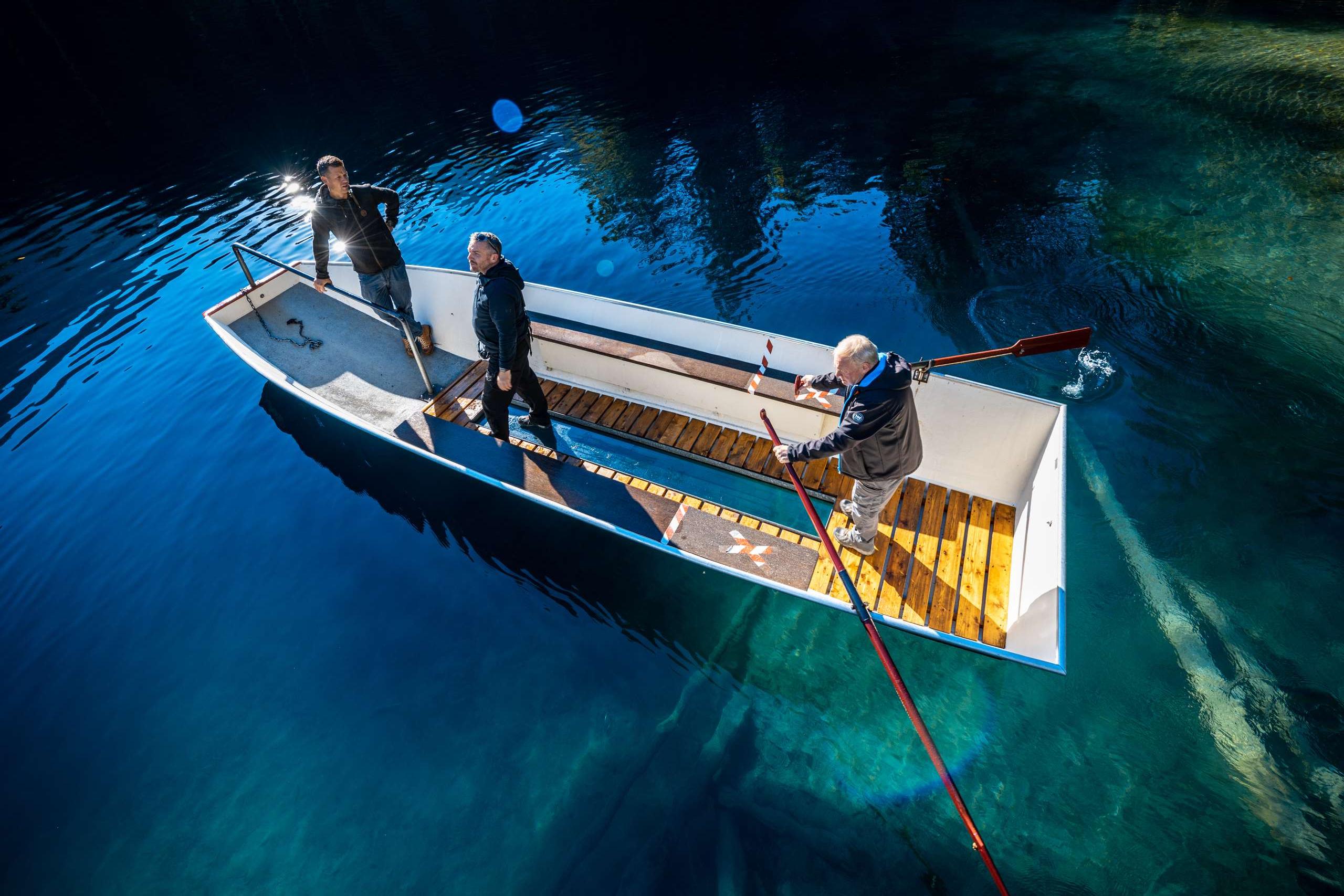 Divers were hired to place the stage on the lake.