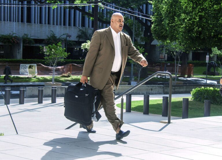 Dennis Oda / The Star-Advertiser via AP