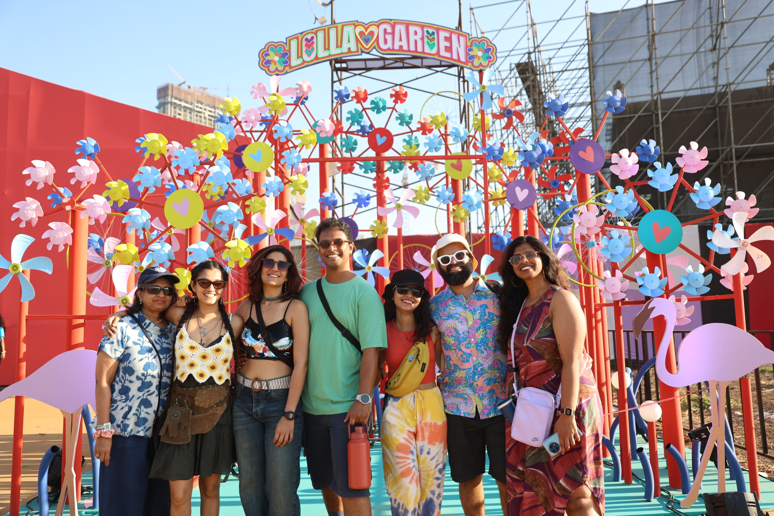 Fans posing in front of lolla garden at Lollapalooza India 2025 Produced and Promoted by BookMyShow Live