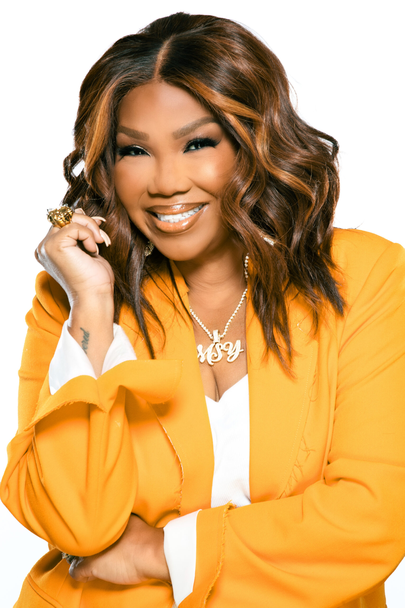 Mona Scott Young orange photo by Derek Blanks with crowdMGMT