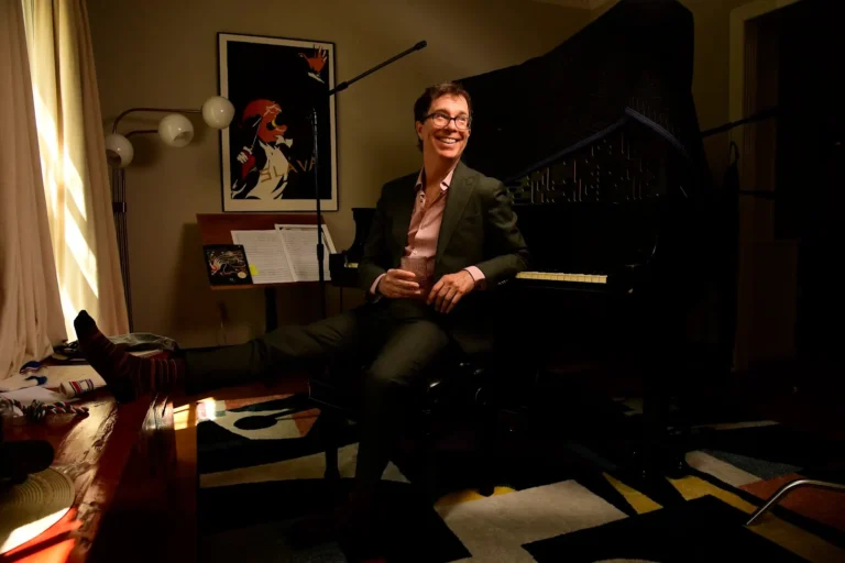 Ben at the piano smiling