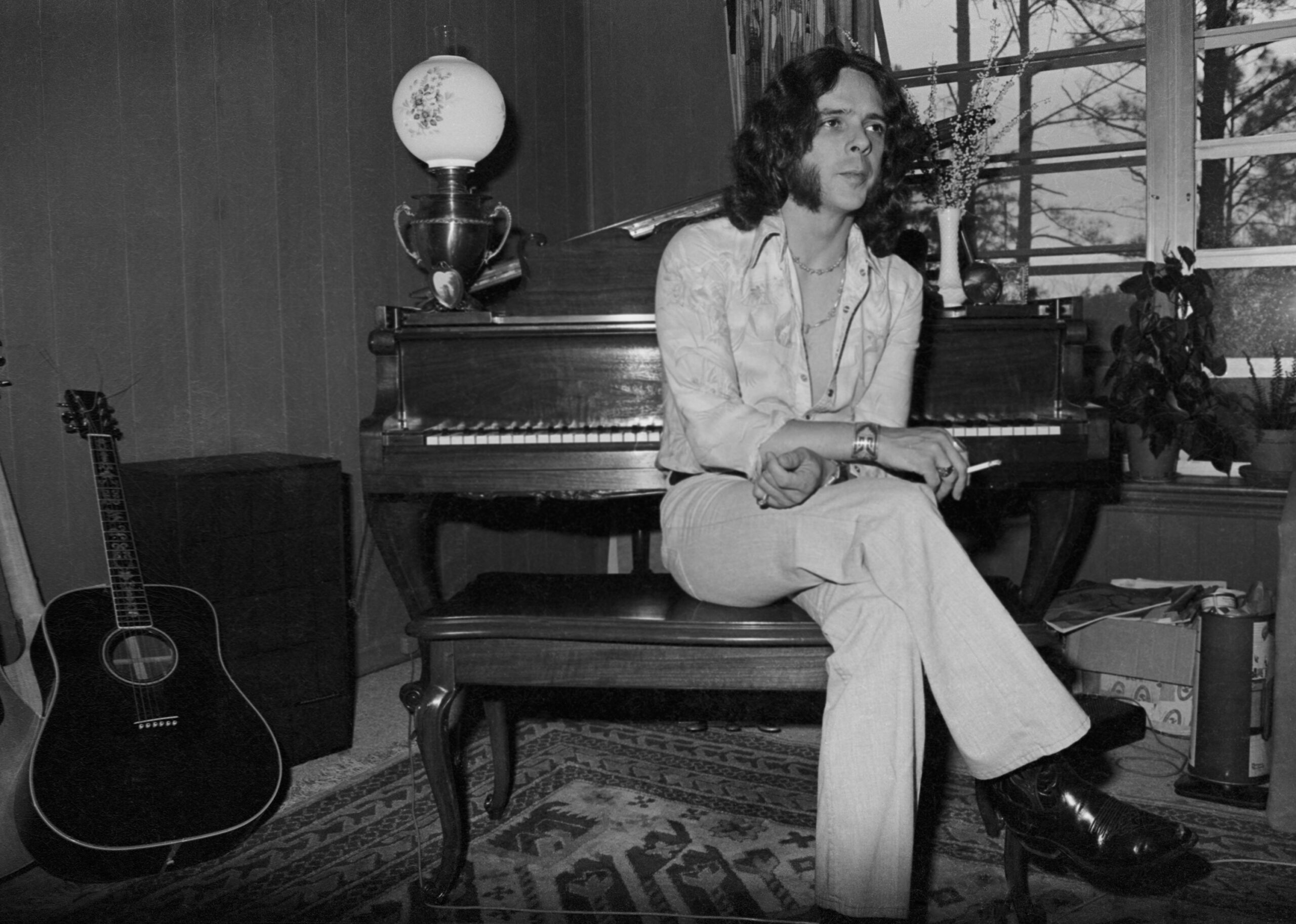 Bobby Whitlock Sits On A Piano Bench