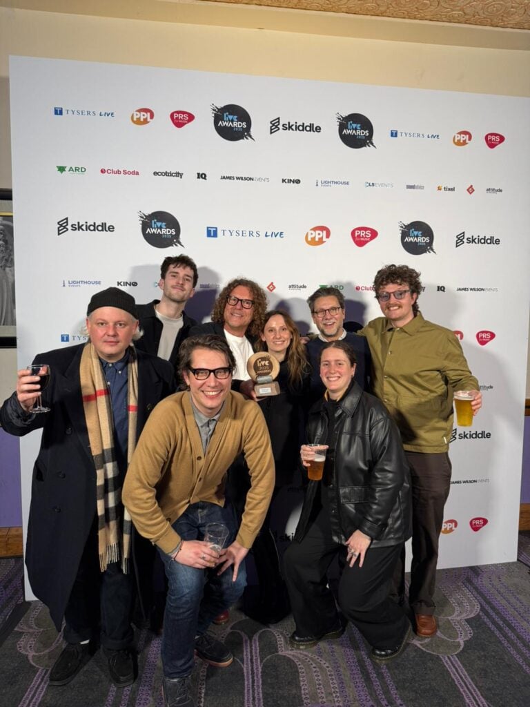 Team accepting LIVE award