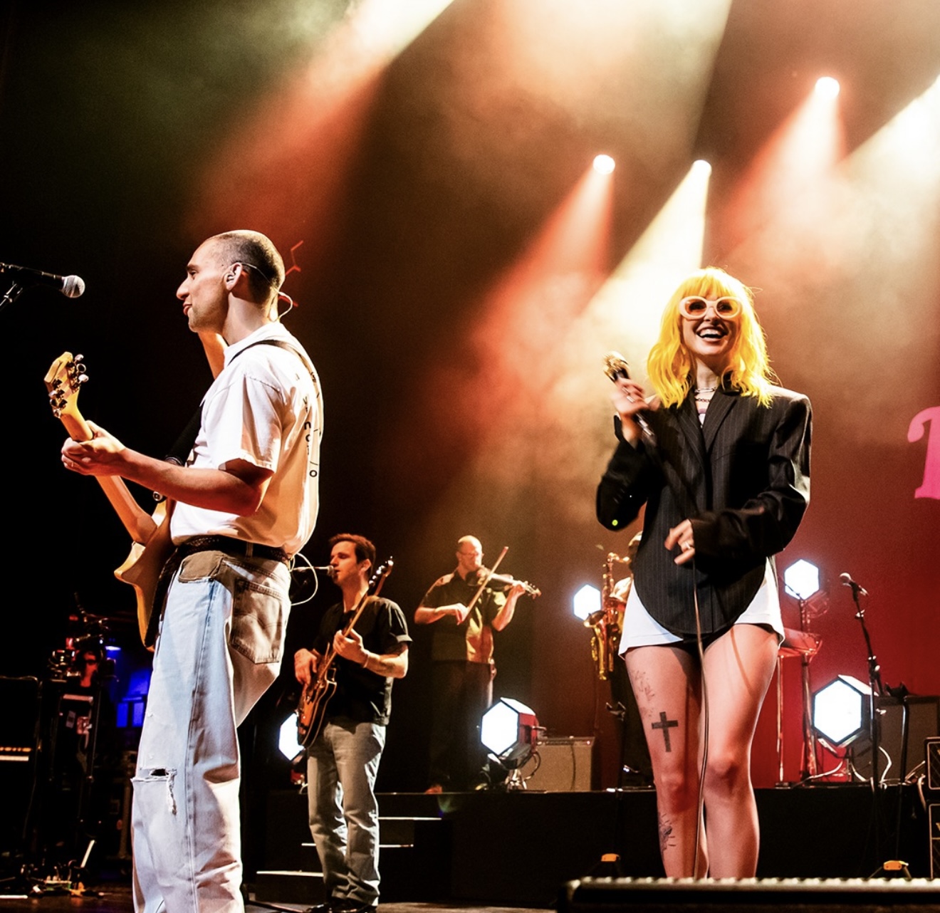 Hayley Williams and Jack Antonoff on stage.