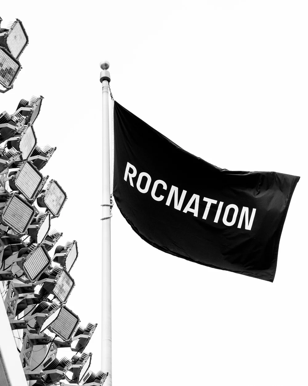 Roc Nation flag blowing in the summer air at Yankee Stadium during Hov's day one show.